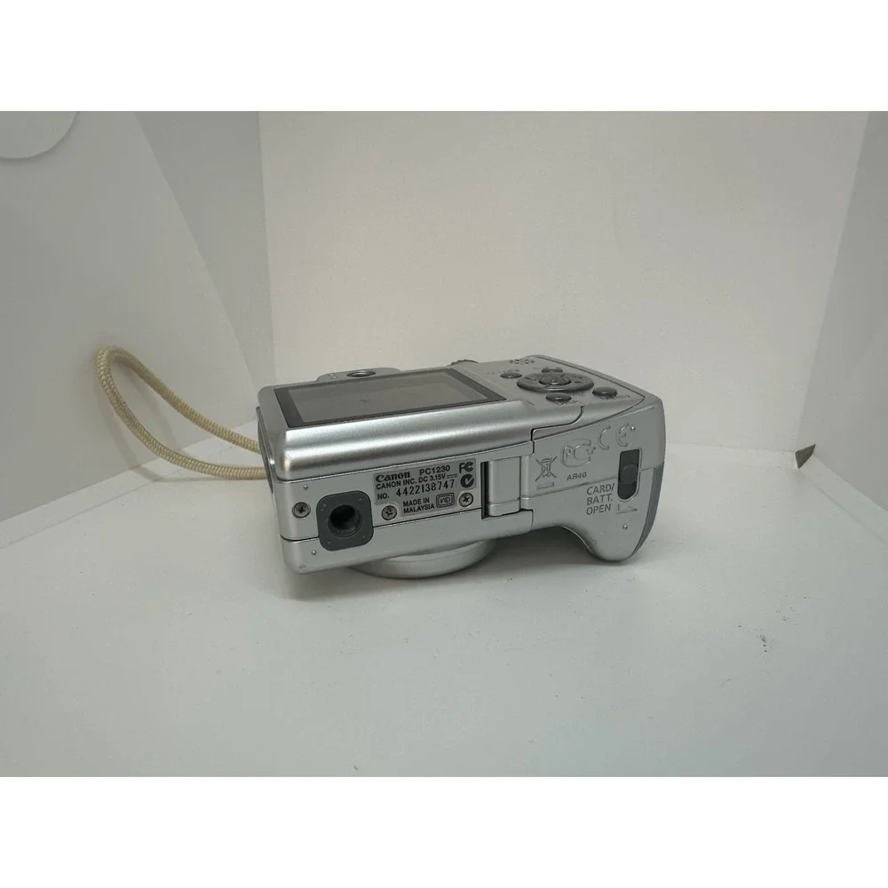 Canon PowerShot A550 7.1MP Digital Camera FOR PARTS CORRODED